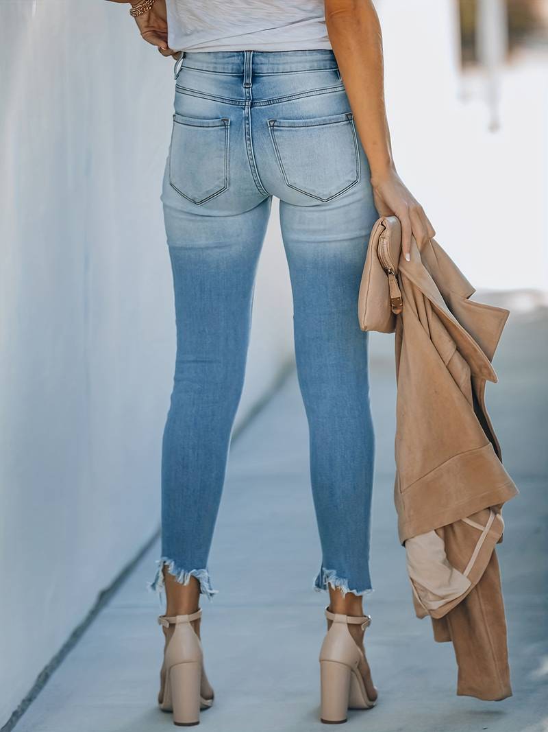 Jeans Cropped Raw – Calça Skinny com Bainha Desfiada e Rasgos Modernos